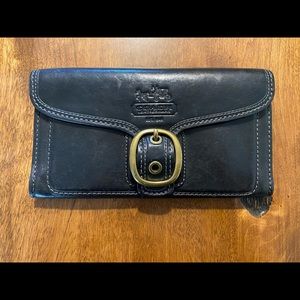 Coach wallet- black with bronze buckle. Used.